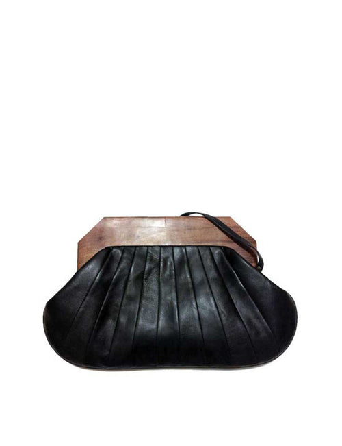 origami inspired clutch bag in leather with wooden handle accent. 