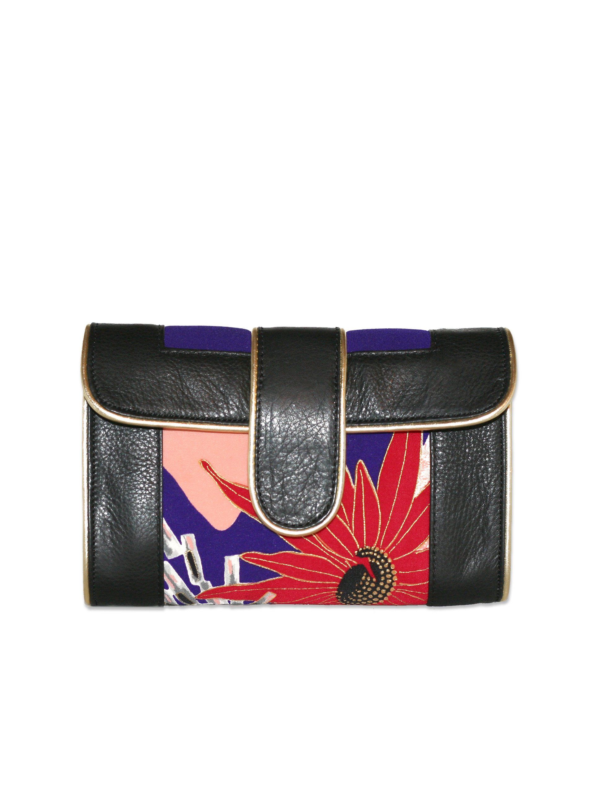 Versatile mini crossbody that easily transforms from day to night. The main fabric features a unique print that was cut from an authentic, vintage kimono of abstract flowers. Handmade mini crossbody is a one-of-a-kind design. 