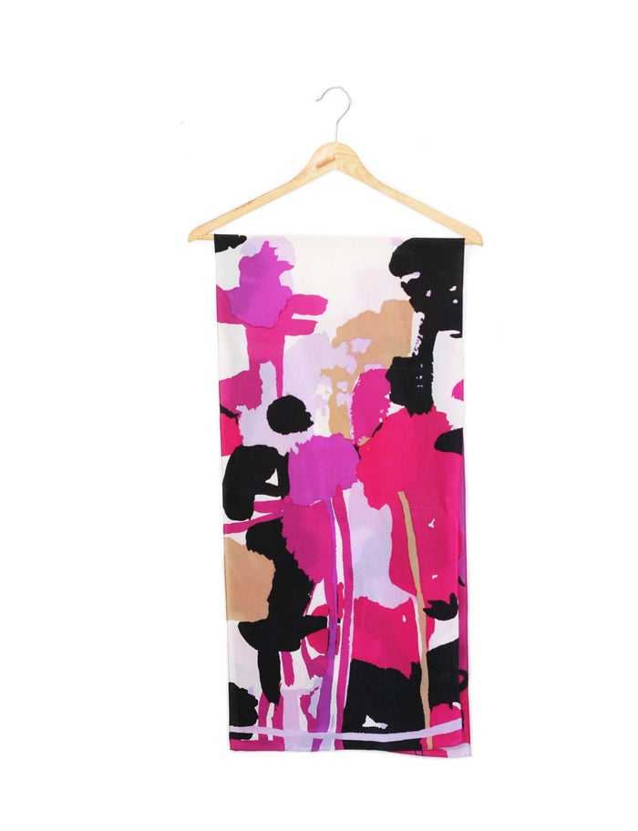 Long Anne Klein silk scarf hanging with bold pink, black, and beige abstract pattern